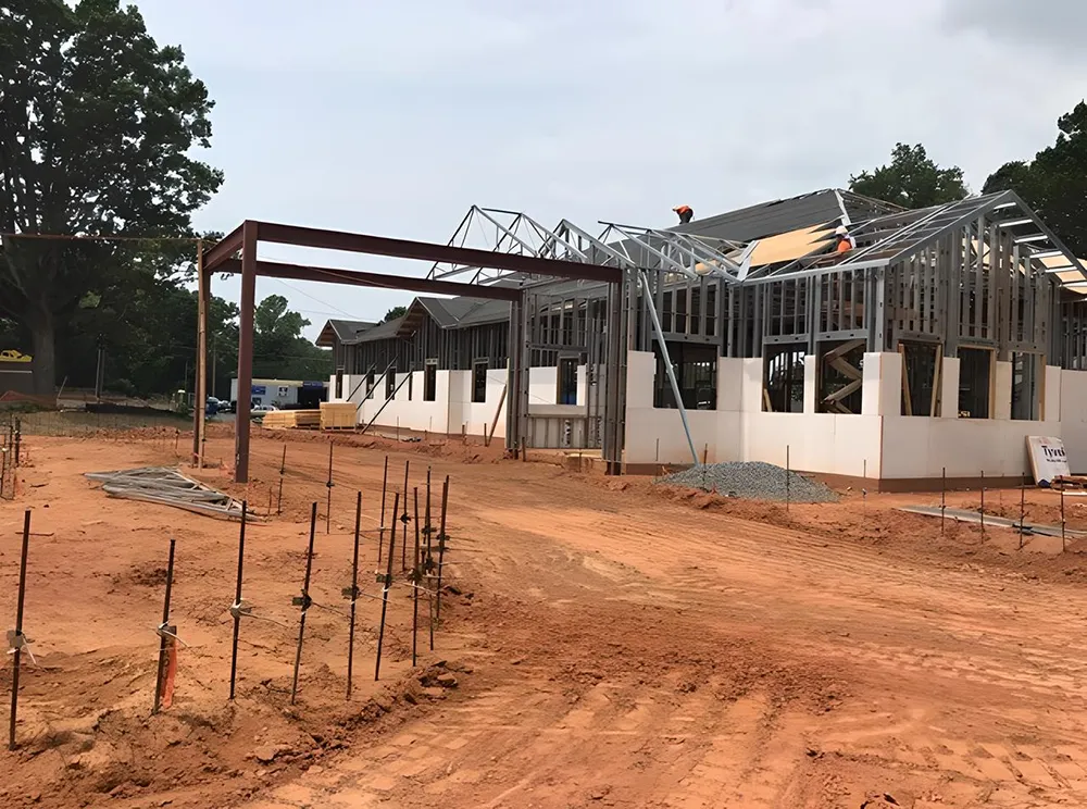 Exterior photo of office under construction with IQ Brick